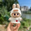 chompa de corazon con gorra blanco